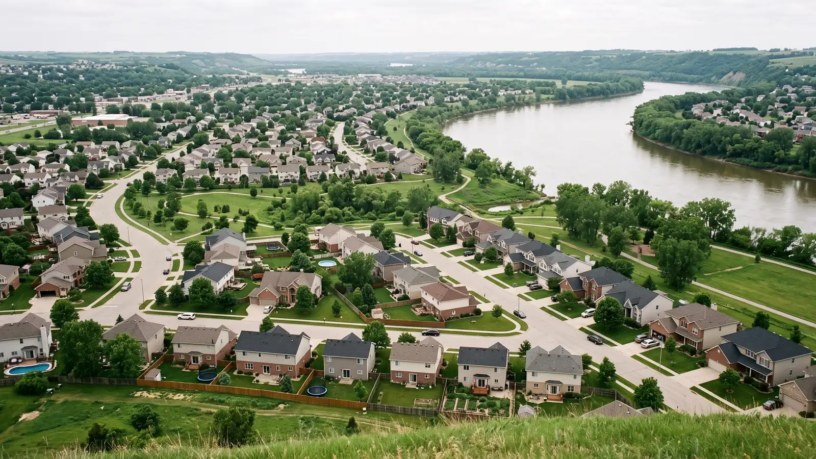 River floodplain bordering an American suburban development